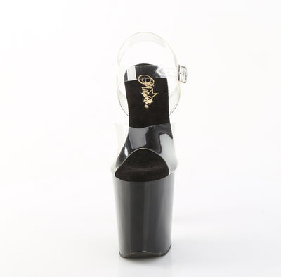 Front view of black platform heels with clear strap and iridescent rhinestone heel