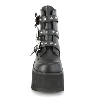 front view of demonia ashes-55 platform boots showing studs and tongue of boot