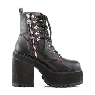 Inner side view of Demonia Assault-100 black platform boot showing side zip