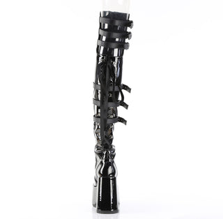 Back view of Demonia Camel-308 black patent thigh-high boot showing ribbon lacing and platform heel