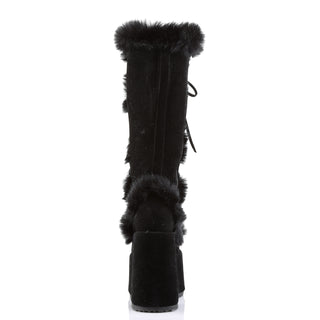 Black platform knee-high boots with block heel and faux fur trim, back view