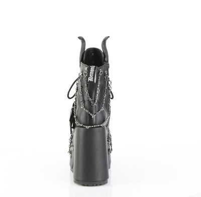 Demonia Camel‑64 black platform ankle boot, outer side view, with chunky heel, devil horns, claw spikes, and barbed wire chain details, on a white background.