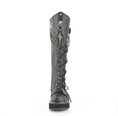 Front view of Demonia Emily-221 black knee-high platform boot with skull buckle and chain details on white background