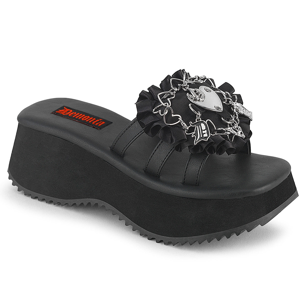 Demonia Flip-16 platform slide sandal with a thick wedge sole, ruffled black strap, and silver heart and cross gothic charm detailing.