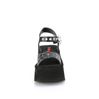 Front view of Demonia FUNN-10 platform sandals showing spiderweb embroidery on vamp strap