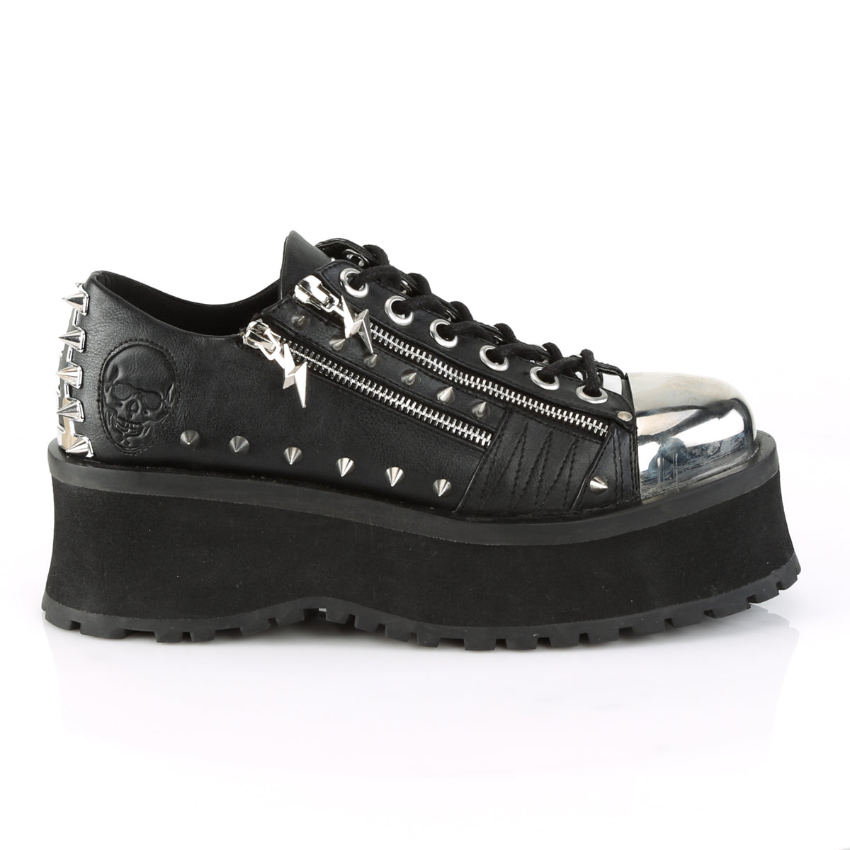 Outer side view of Demonia Gravedigger-04 black platform Oxford with chrome toe cap, double zippers, pyramid studs, and embossed skull detail on heel.