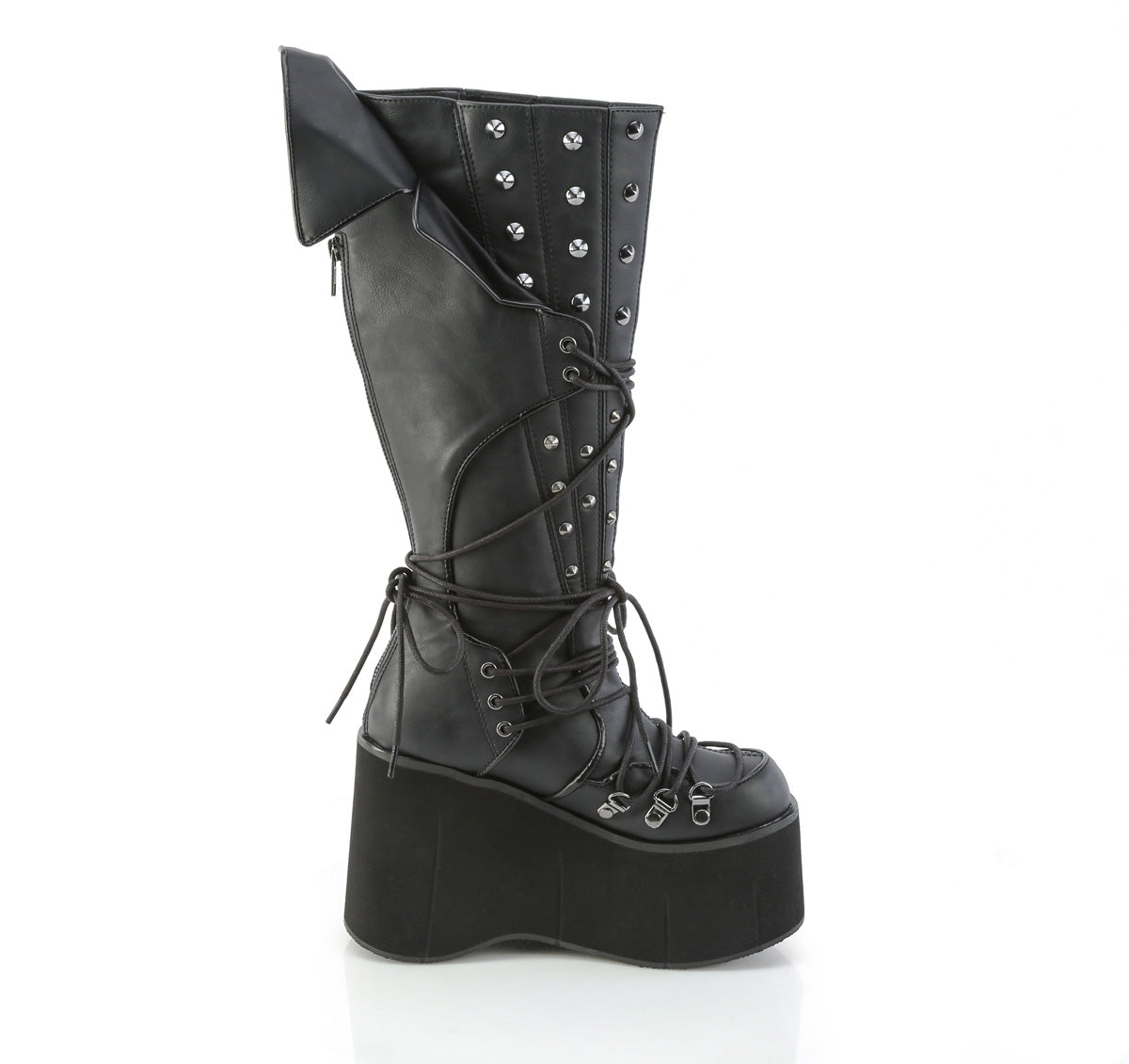 Side view of Demonia KERA-203 black knee-high platform boot with 4.5-inch sole, D-ring lacing, cone spike studs, and vampiric back panel on white background.