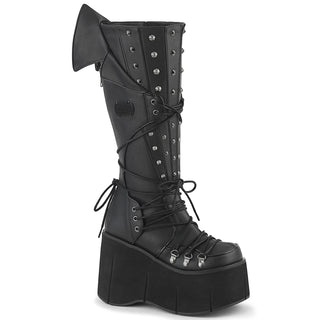 Demonia KERA-203 knee-high black platform boot with 4.5-inch sole, D-ring lacing, cone spike studs, vampiric back panel, and full side zip on white background