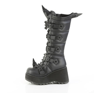 Inner side view of Demonia SCENE-157 black knee-high platform boots with bat-shaped buckles and sculpted horn details