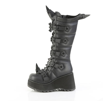 Inner side view of Demonia SCENE-157 black knee-high platform boots with bat-shaped buckles and sculpted horn details