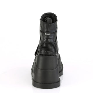 Demonia Stomp-13 black wedge platform ankle boot with quilted back panel and logo detail, back view on white background.