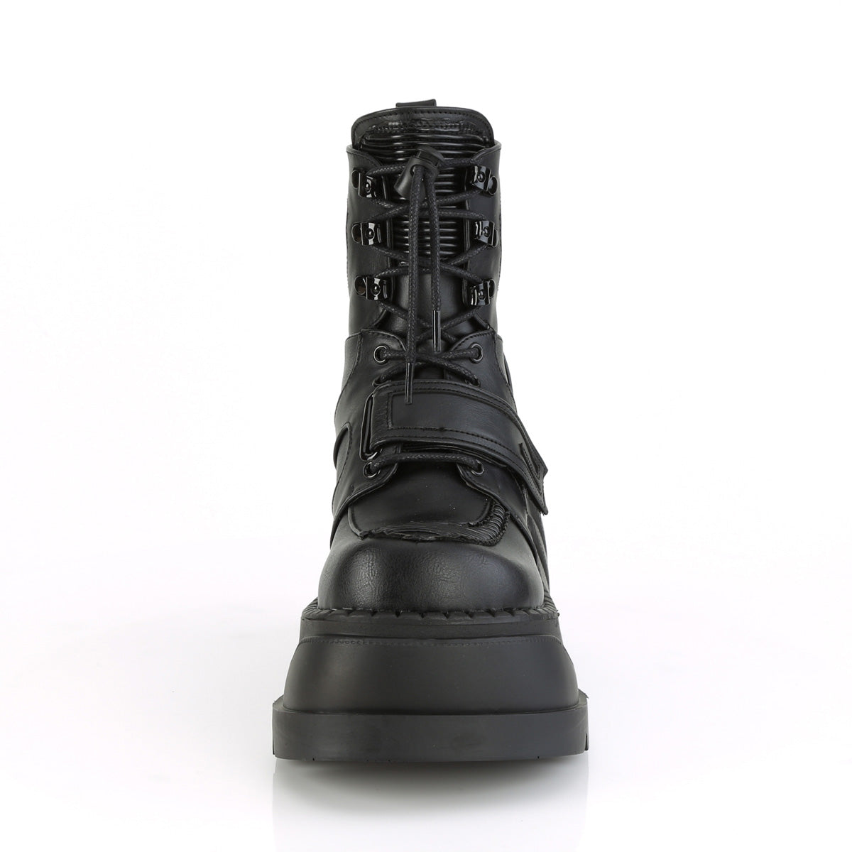 Demonia Stomp-13 black wedge platform ankle boot with lace-up front and hook-and-loop strap, front view on white background.