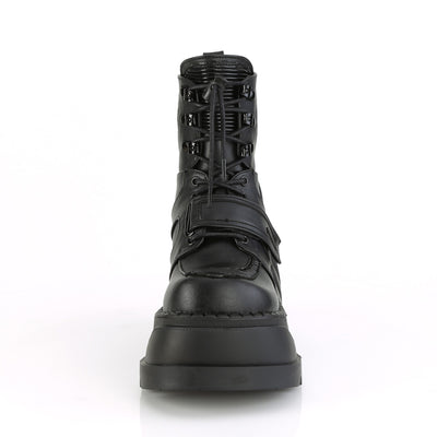 Demonia Stomp-13 black wedge platform ankle boot with lace-up front and hook-and-loop strap, front view on white background.