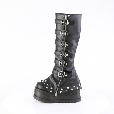 Side view of Demonia Stomp-223 black platform boots showing buckle straps, front zipper, and studded trim