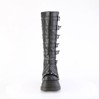 Front view of Demonia Stomp-223 black platform boots with buckle straps and studded toe panel