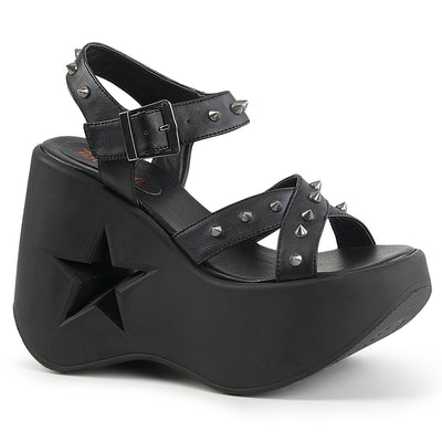 Chunky black wedge sandal with multiple studded straps and star detail.