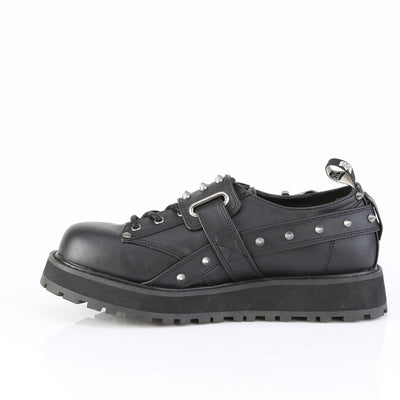 Side view of Demonia Valor-38 showing black vegan leather and platform sole