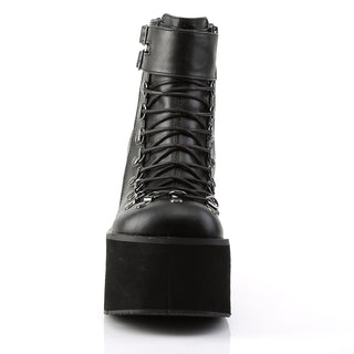 Front view of Demonia Kera-21 black wedge platform boot showing lace-up closure and ankle cuff