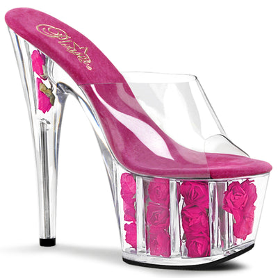 Clear platform mule heels with pink flower-filled lucite base

