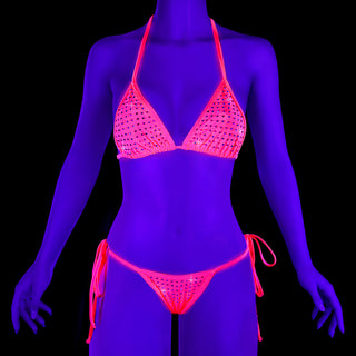 Pleaser Candy-01RS neon hot pink rhinestone bikini set glowing under UV blacklight.