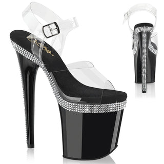 Black platform heels with clear straps and rhinestone trim.