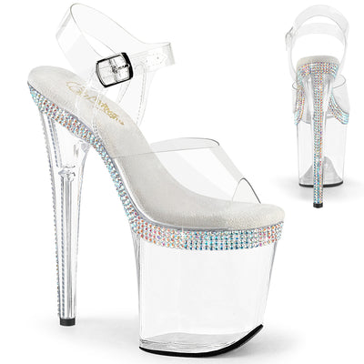 Clear high heel sandal with a rhinestone-trimmed platform and ankle strap.