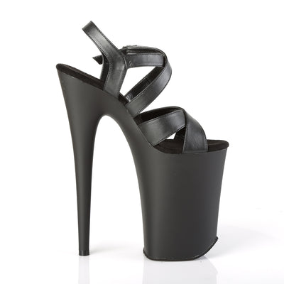 Black 9-inch platform heel with criss-cross straps shown from inner side on a white background.