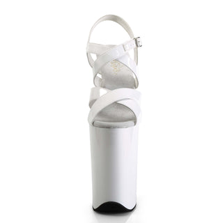 White 9-inch platform heel sandal, front view, with criss-cross straps.
