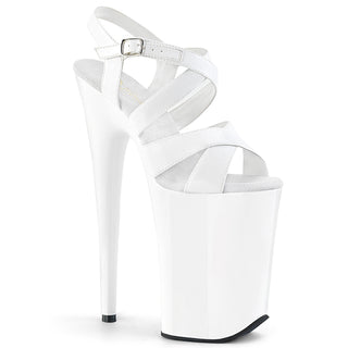 Pleaser Infinity-9967 white 9-inch platform heel sandal with crossover straps on white background.