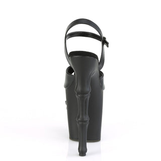 Rear view of Pleaser Rapture‑809 black PU pole sandal with bone‑style stiletto heel and skull‑sculpted platform, on a white background.