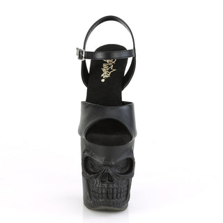 Front view of Pleaser Rapture‑809 black PU pole sandal with skull‑sculpted platform and ankle strap, on a white background.