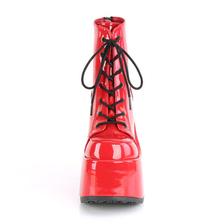 Front view of Demonia Camel-203 red patent platform boots with black laces