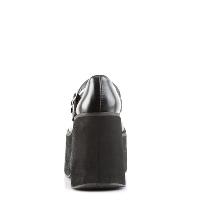 Back view of black platform Mary Jane shoe with double buckle straps and chunky wedge heel.