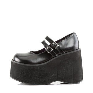 Outer side view of black platform Mary Jane shoe with double buckle straps and tall wedge sole.