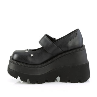 inner side view of demonia shaker-23 black pu wedge platform mary janes