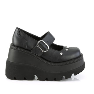 outer side view of demonia shaker-23 black pu wedge platform mary janes showing buckles