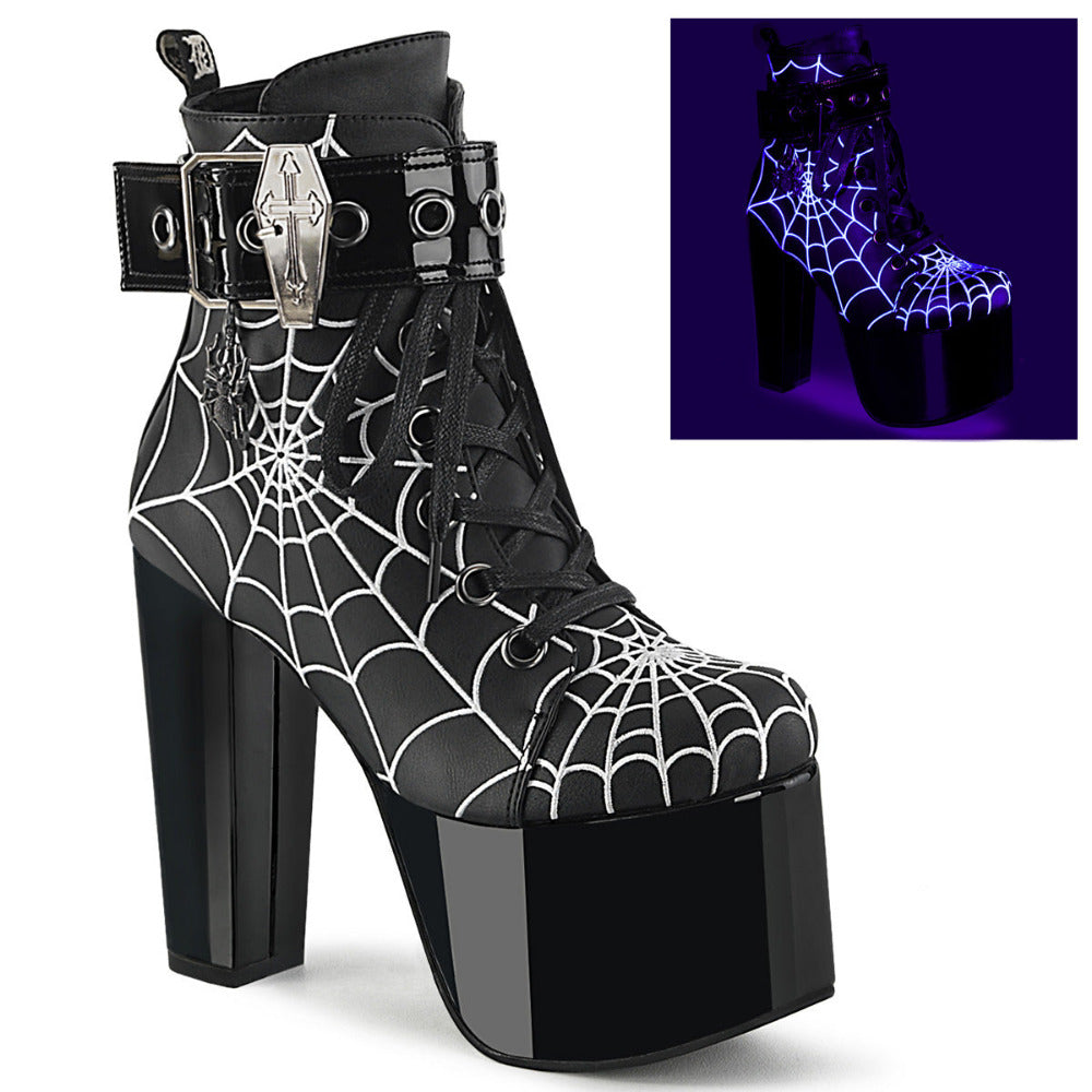 Demonia Torment-51 black platform boots with spider web pattern, coffin buckle, and UV-reactive design, ideal for gothic looks, raves, and parties.