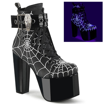 Demonia Torment-51 black platform boots with spider web pattern, coffin buckle, and UV-reactive design, ideal for gothic looks, raves, and parties.