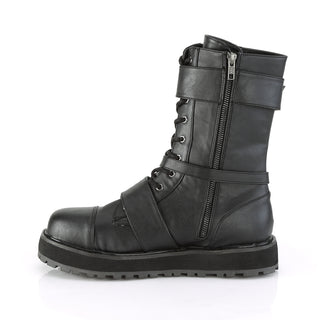 Mid-calf classic combat boots — buckled, harnessed, and O-ringed to make your outfit hit harder. Solid. Functional.